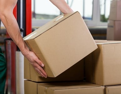 Man lifting box using correct Manual Handling technique