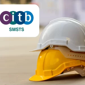 two managers hard hard hats stacked onto of each other